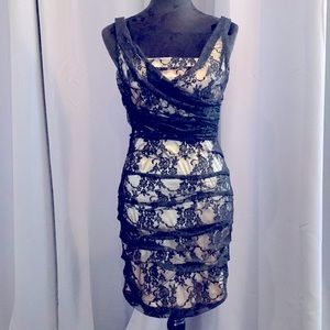 Sexy lace dress with cream lining from EXPRESS. Size 6. BRAND NEW; NEVER WORN!